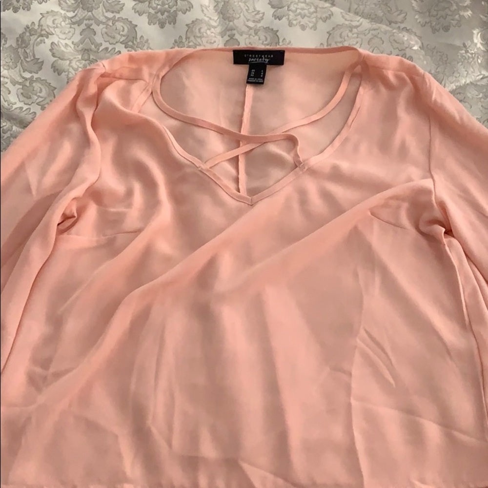 A crossed top.